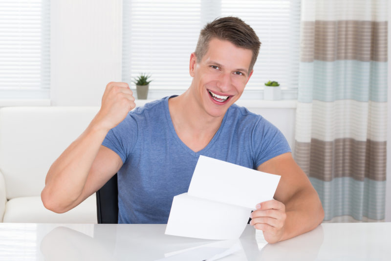 man happy with bills