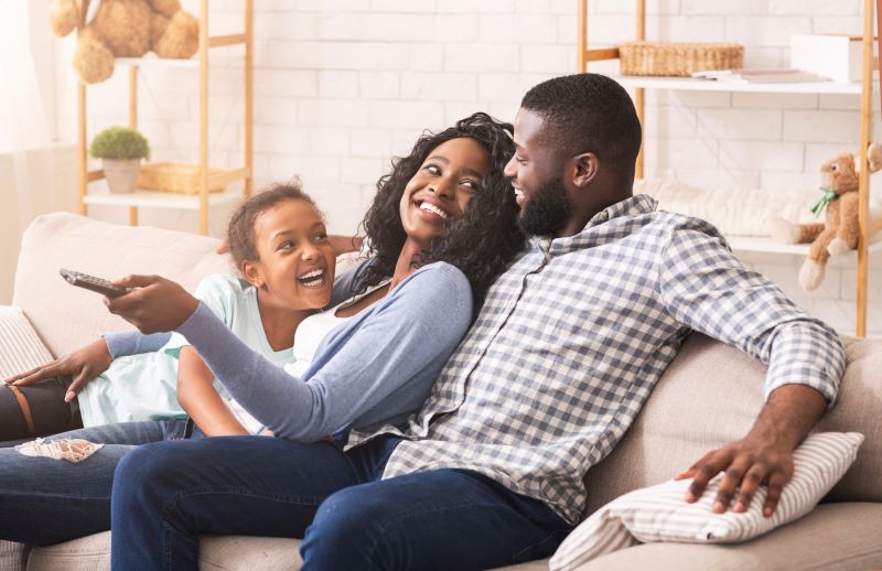 Happy Family On Couch